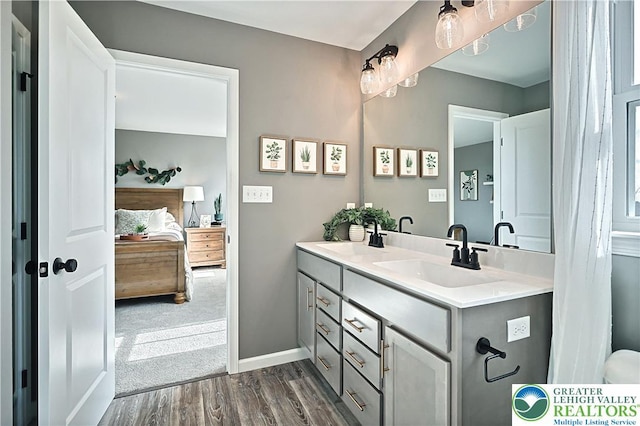 3220 Eisenhower Dr, Allen Twp, PA 18067 - ensuite bathroom with wood finished floors and double vanity