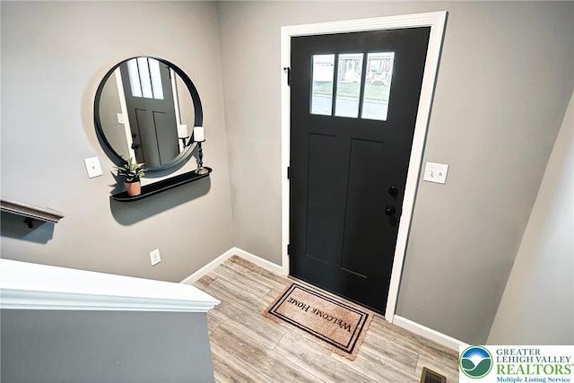3220 Eisenhower Dr, Allen Twp, PA 18067 - foyer with light wood-style flooring and plenty of natural light