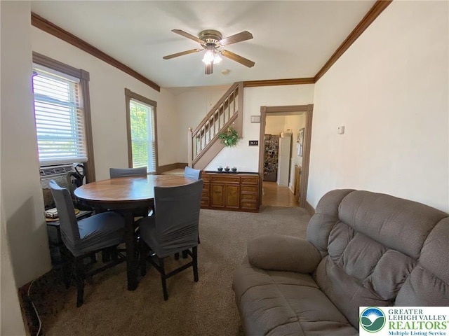 1139 Jackson St, Easton, PA 18042 - dining area with stairs, light colored carpet, ceiling fan, ornamental molding, and cooling unit