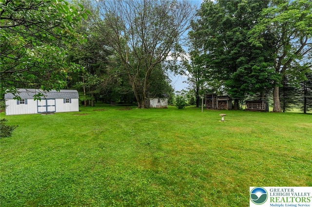 2560 Community Dr, Moore Twp, PA 18014 - view of green lawn featuring a storage shed