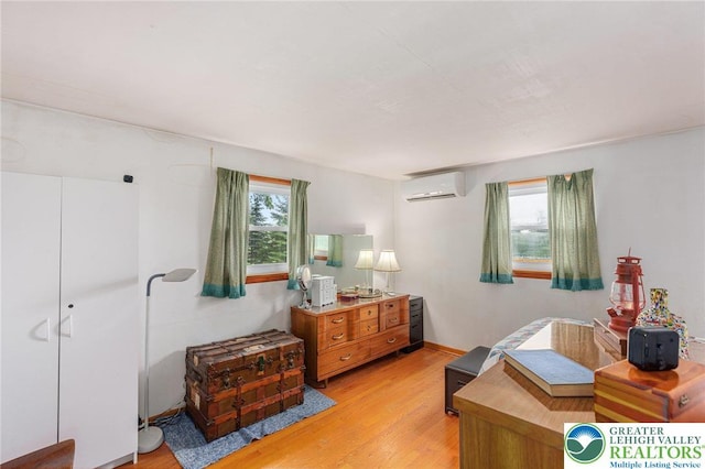 2560 Community Dr, Moore Twp, PA 18014 - office area featuring a wall mounted air conditioner and light wood-style floors