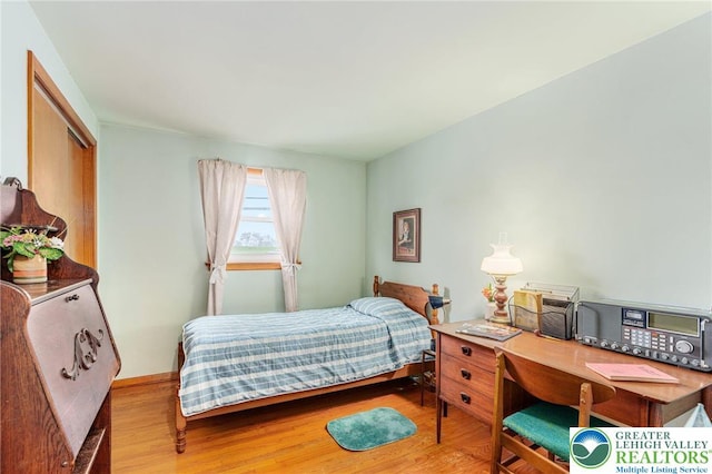 2560 Community Dr, Moore Twp, PA 18014 - bedroom with wood finished floors and a closet
