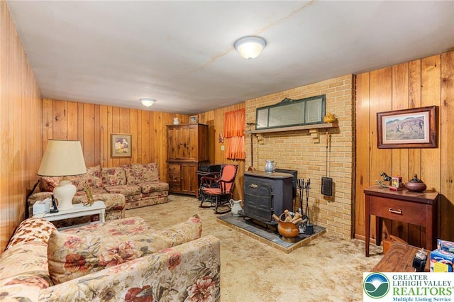 2560 Community Dr, Moore Twp, PA 18014 - carpeted living room with a wood stove and wood walls