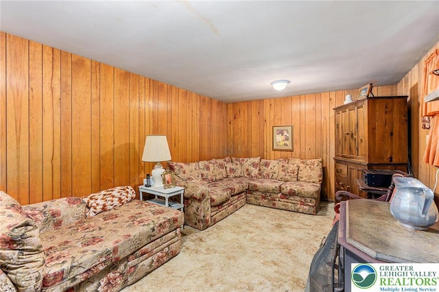 2560 Community Dr, Moore Twp, PA 18014 - carpeted living room featuring wooden walls