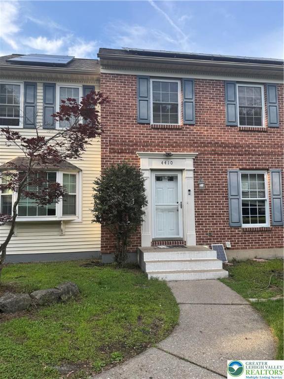 4410 Greenfield Rd, Hanover Twp, PA 18017 - townhome / multi-family property featuring brick siding and a front lawn