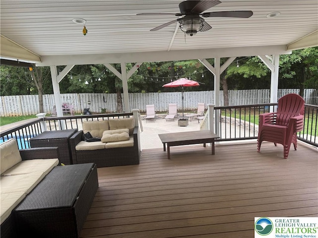 4410 Greenfield Rd, Hanover Twp, PA 18017 - deck with an outdoor living space, a fenced backyard, and a ceiling fan