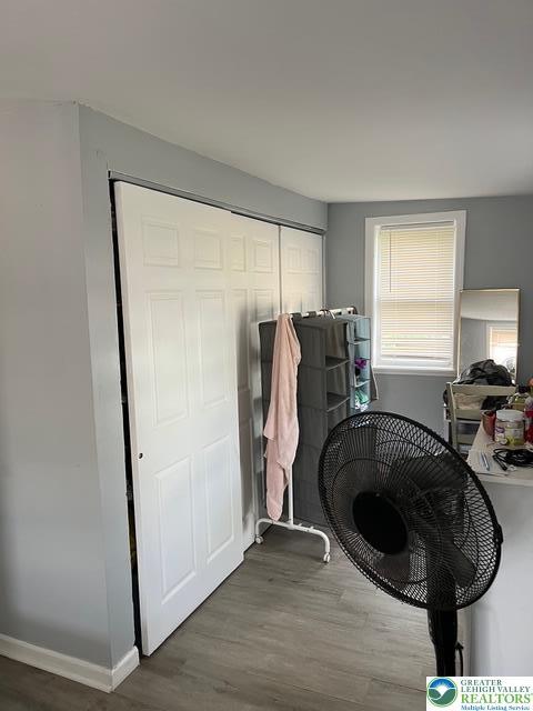 103 N Oak St, Easton, PA 18042 - laundry room featuring wood finished floors and baseboards