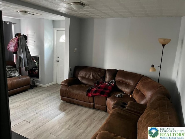 103 N Oak St, Easton, PA 18042 - living area featuring wood finished floors and baseboards