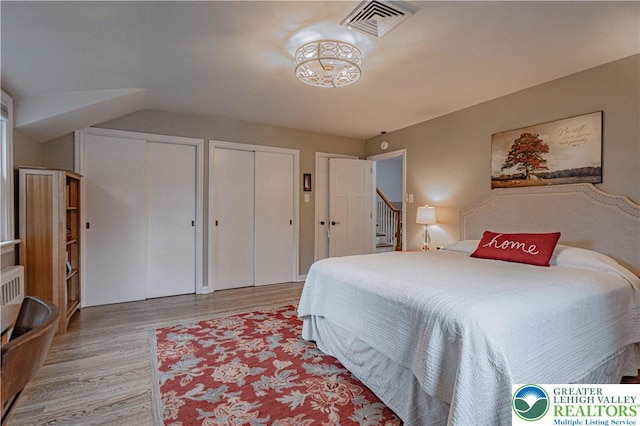 326 N Main St, Allentown City, PA 18104 - bedroom featuring wood finished floors and two closets
