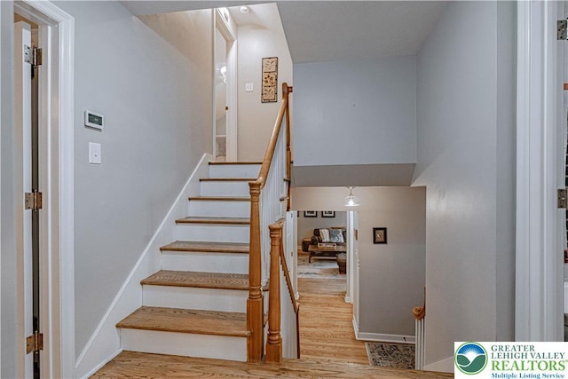 326 N Main St, Allentown City, PA 18104 - staircase with wood finished floors and baseboards