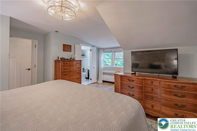 326 N Main St, Allentown City, PA 18104 - bedroom featuring lofted ceiling, light wood-type flooring, radiator, and ensuite bath