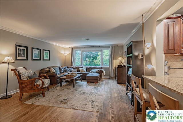 326 N Main St, Allentown City, PA 18104 - living room with wood finished floors and ornamental molding