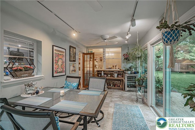 326 N Main St, Allentown City, PA 18104 - dining room with rail lighting, a ceiling fan, and beverage cooler