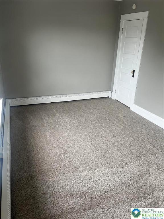 827 Louis St, Easton, PA 18042 - spare room featuring baseboards and carpet