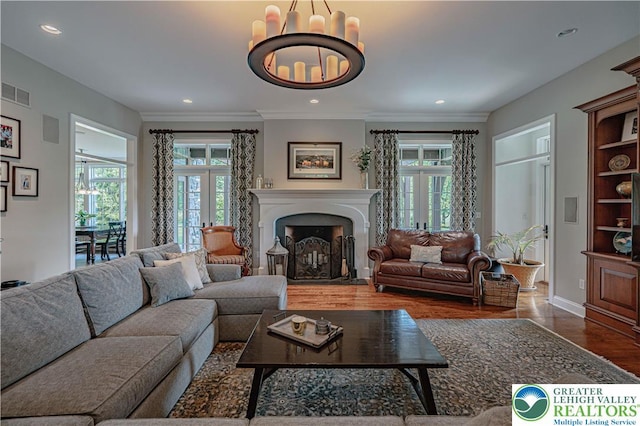 3054 Jordan Rd, North Whitehall Twp, PA 18069 - living room featuring french doors, wood finished floors, a chandelier, recessed lighting, and a fireplace