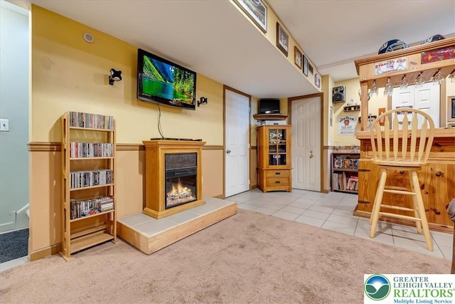 617 Lehigh Gap St, Walnutport Boro, PA 18088 - carpeted dining room featuring a fireplace and tile patterned flooring