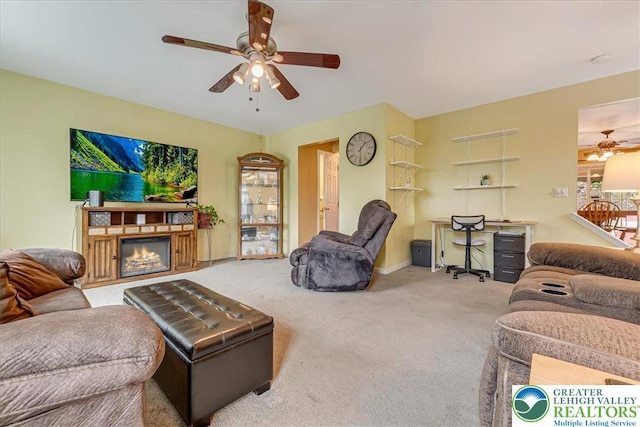 617 Lehigh Gap St, Walnutport Boro, PA 18088 - living area with a ceiling fan, carpet flooring, and a glass covered fireplace
