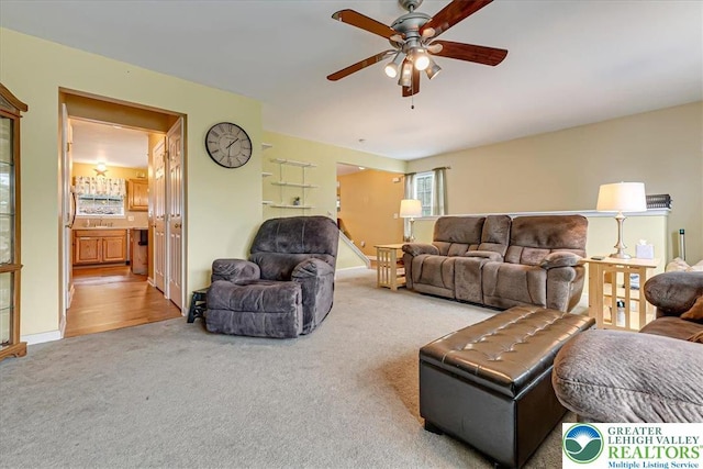 617 Lehigh Gap St, Walnutport Boro, PA 18088 - carpeted living room with ceiling fan and baseboards
