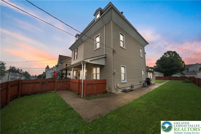 20 N 3rd St, Coplay Boro, PA 18037 - rear view of house with a fenced backyard and a gate