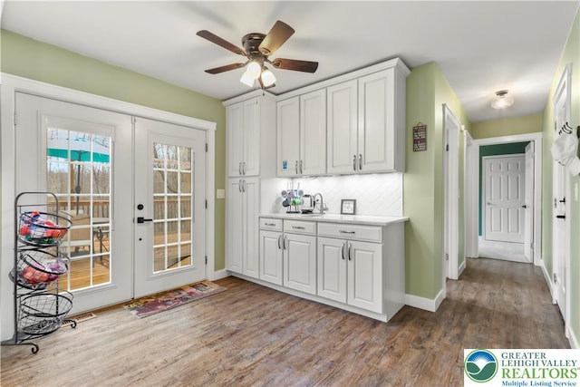 1661 Marjorie Ct, Middle Smithfield Twp, PA 18302 - doorway featuring french doors, wood finished floors, and ceiling fan