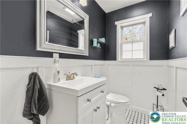 1661 Marjorie Ct, Middle Smithfield Twp, PA 18302 - bathroom with vanity, a decorative wall, and wainscoting