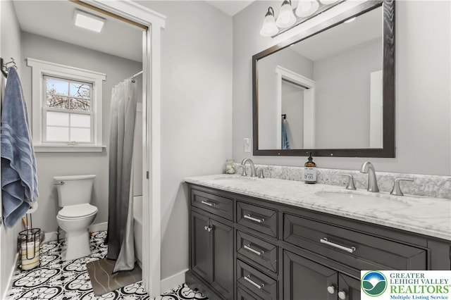 1661 Marjorie Ct, Middle Smithfield Twp, PA 18302 - bathroom featuring double vanity and toilet