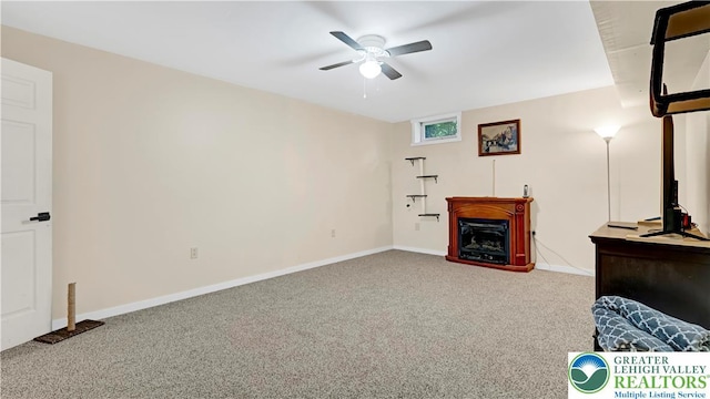 1661 Marjorie Ct, Middle Smithfield Twp, PA 18302 - living room with carpet floors, a ceiling fan, and a fireplace