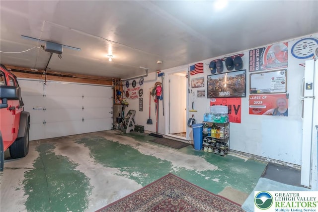 3195 Audubon St, Palmer Twp, PA 18045 - garage featuring a garage door opener