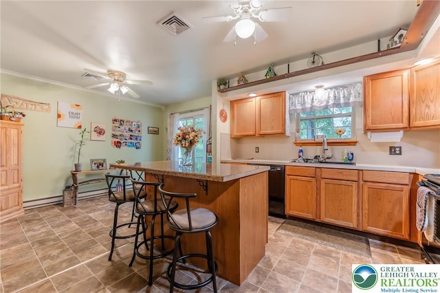 3195 Audubon St, Palmer Twp, PA 18045 - kitchen with a ceiling fan, black dishwasher, plenty of natural light, and a breakfast bar area