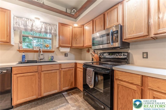 3195 Audubon St, Palmer Twp, PA 18045 - kitchen with stainless steel microwave, black range with electric cooktop, dishwashing machine, and light countertops