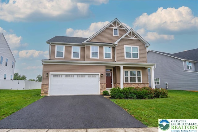 3610 Sweet Meadow Ct, Macungie Boro, PA 18062 - craftsman house with stone siding, an attached garage, asphalt driveway, and a porch