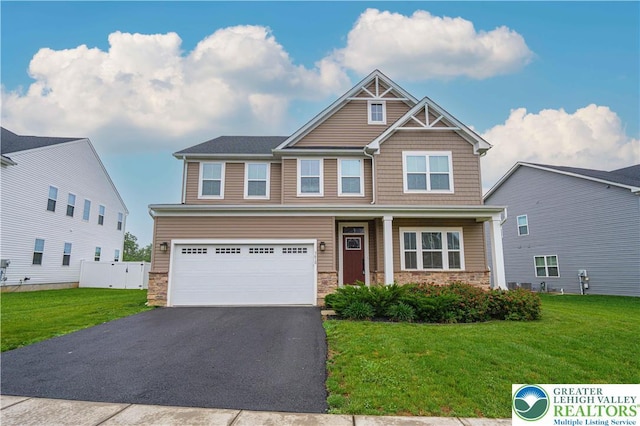 3610 Sweet Meadow Ct, Macungie Boro, PA 18062 - craftsman inspired home featuring stone siding, a garage, and driveway