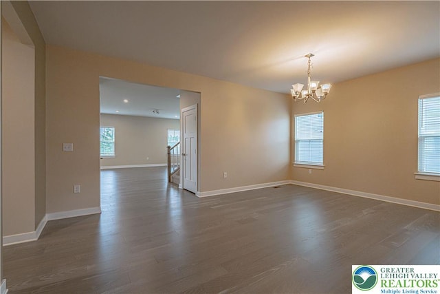 3610 Sweet Meadow Ct, Macungie Boro, PA 18062 - spare room featuring a chandelier and dark wood-style flooring