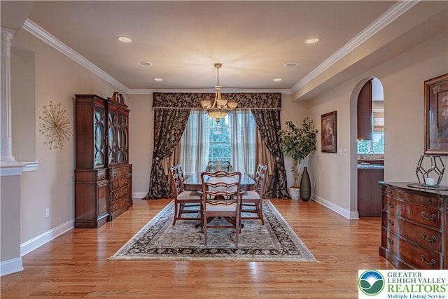 6532 Forest Knoll Ct, Upper Macungie Twp, PA 18106 - dining space with a chandelier, light wood-style flooring, arched walkways, crown molding, and recessed lighting