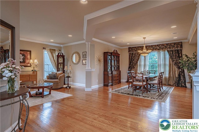 6532 Forest Knoll Ct, Upper Macungie Twp, PA 18106 - dining space with decorative columns, wood finished floors, recessed lighting, and crown molding