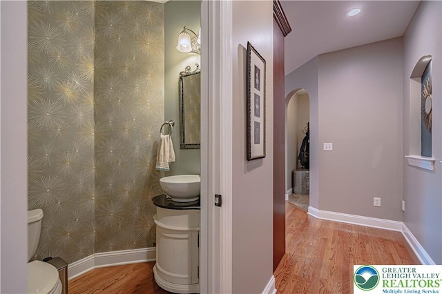 6532 Forest Knoll Ct, Upper Macungie Twp, PA 18106 - bathroom with wood finished floors and vanity