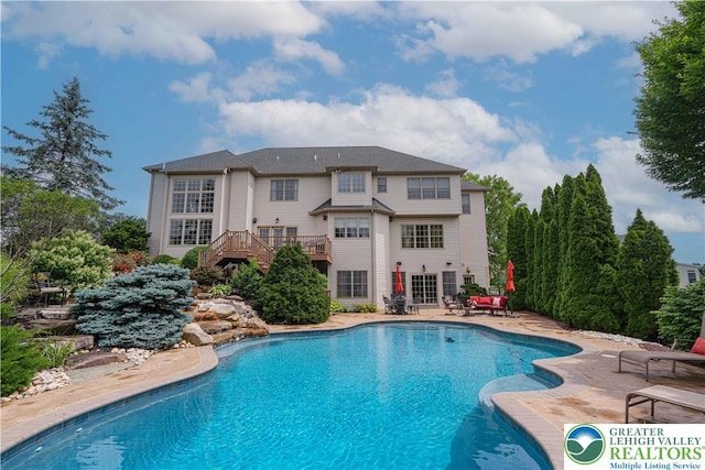 6532 Forest Knoll Ct, Upper Macungie Twp, PA 18106 - swimming pool featuring stairway, a patio area, and a deck