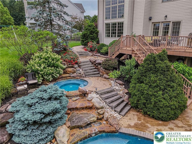 6532 Forest Knoll Ct, Upper Macungie Twp, PA 18106 - view of pool with stairway, an in-ground hot tub, and a wooden deck