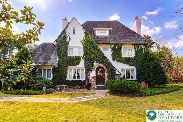 2730 Chew St, Allentown City, PA 18104 - english style home with a chimney, a front yard, and a high end roof