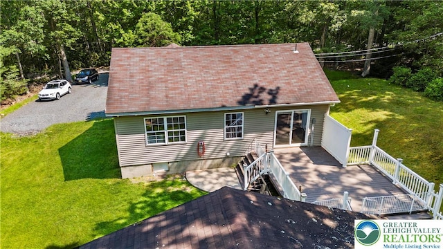 197 Broad Mountain View Dr, Penn Forest Twp, PA 18229 - back of house featuring a yard and a wooden deck