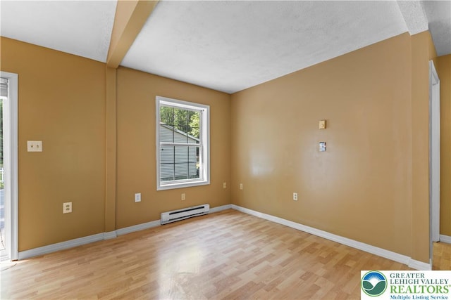 197 Broad Mountain View Dr, Penn Forest Twp, PA 18229 - spare room featuring baseboard heating and light wood-style floors