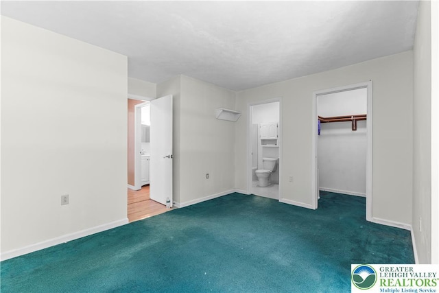 197 Broad Mountain View Dr, Penn Forest Twp, PA 18229 - unfurnished bedroom with carpet, connected bathroom, and a spacious closet