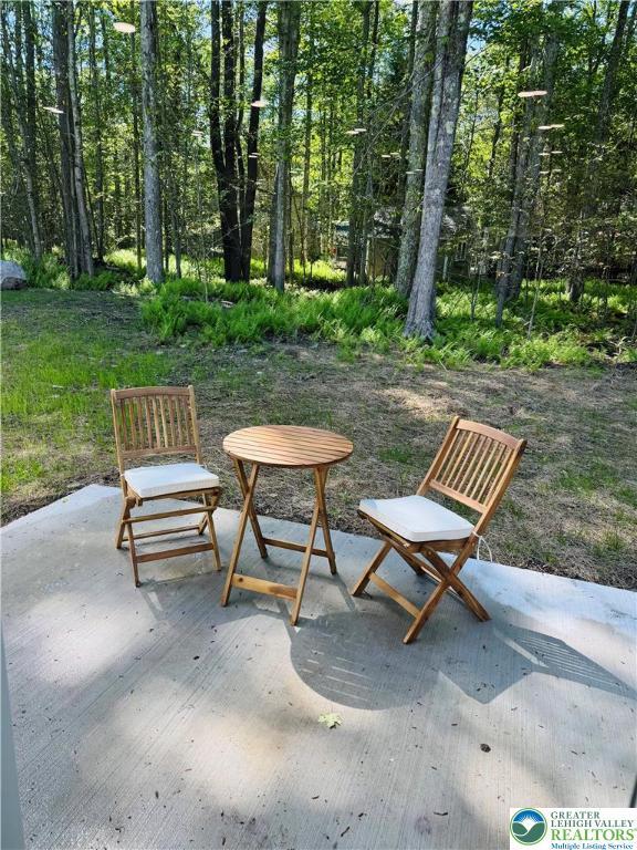 211 Maxatawny Dr, Coolbaugh Twp, PA 18347 - view of patio / terrace
