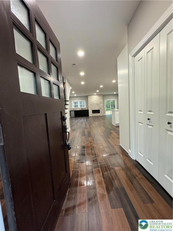 211 Maxatawny Dr, Coolbaugh Twp, PA 18347 - corridor featuring dark wood-style flooring and recessed lighting