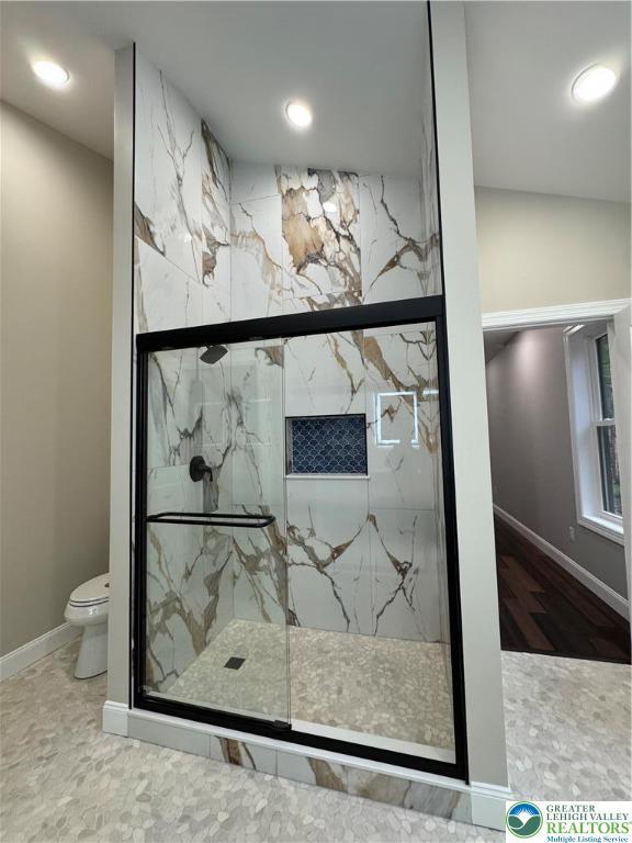 211 Maxatawny Dr, Coolbaugh Twp, PA 18347 - bathroom featuring a marble finish shower and recessed lighting