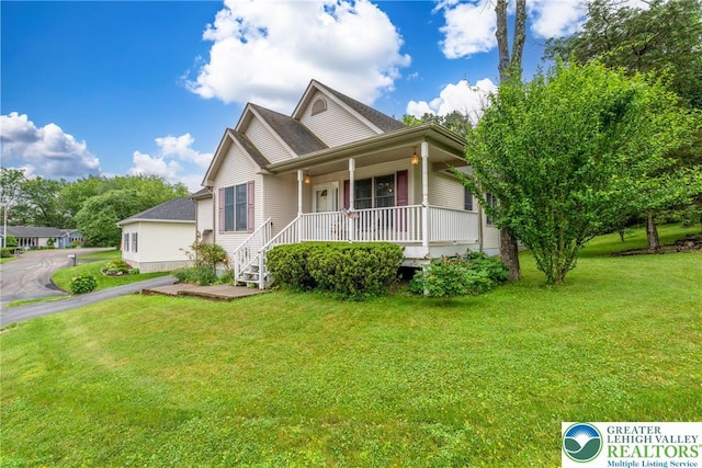 11 Apache Dr, Upper Mt Bethel Twp, PA 18343 - view of front of property with covered porch and a front yard