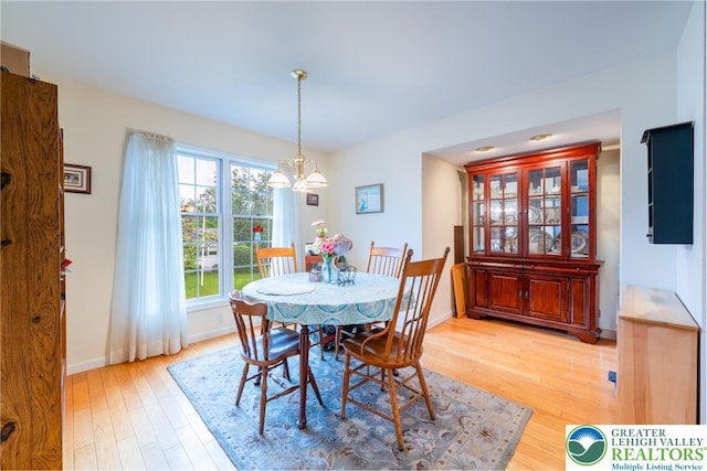 11 Apache Dr, Upper Mt Bethel Twp, PA 18343 - dining area featuring a chandelier and light wood-style floors