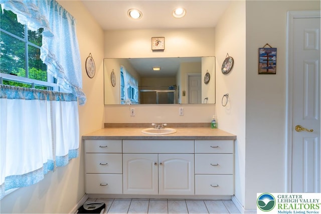 11 Apache Dr, Upper Mt Bethel Twp, PA 18343 - bathroom with vanity, tile patterned floors, and an enclosed shower