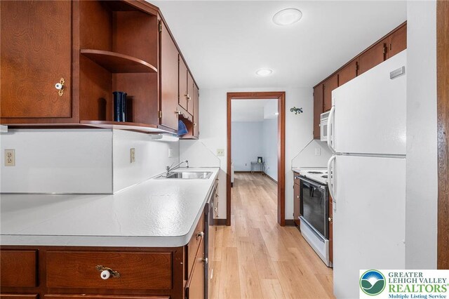 1411 Linden St, Bethlehem City, PA 18018 - kitchen featuring white appliances, light wood-type flooring, open shelves, light countertops, and recessed lighting