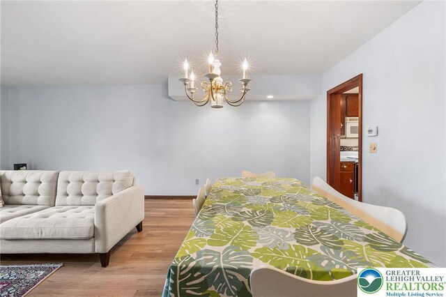 1411 Linden St, Bethlehem City, PA 18018 - bedroom with a chandelier and wood finished floors